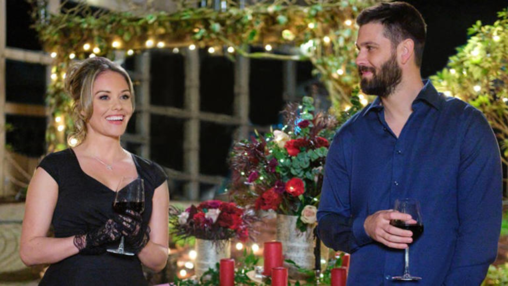 Casey Deidrick with Stephanie Bennett smiling together in an event holding their glasses.