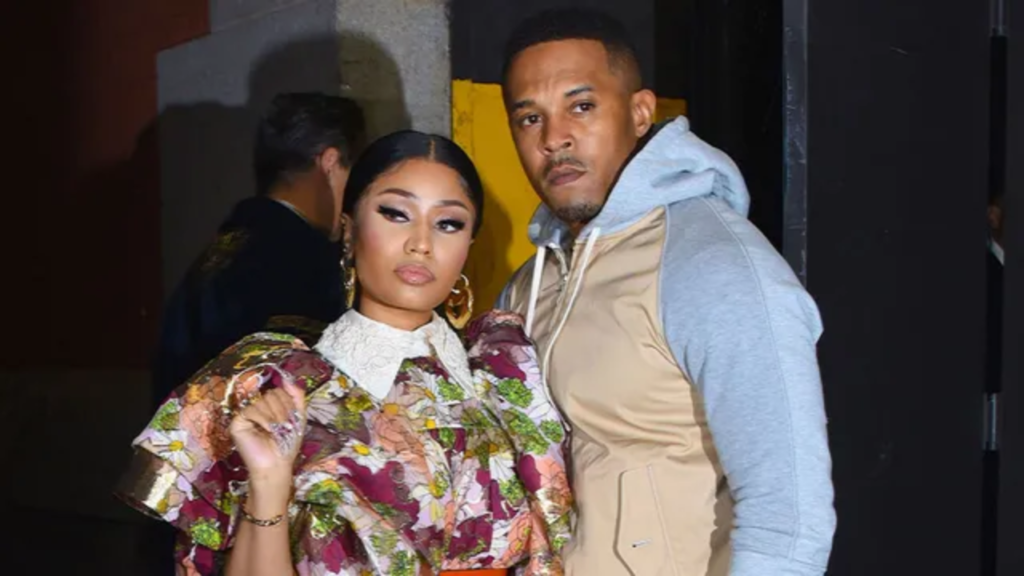 This image shows Nicki Minaj with her husband Kenneth Petty. Both Nicky Minaj and Kenneth Petty are smiling in the image. 