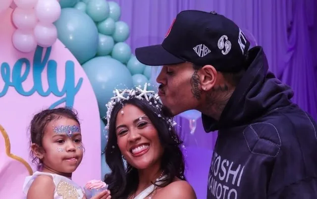 Chris Brown kissing Diamond Brown on the occassion of their daughter's birthday